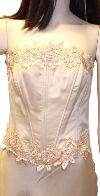 Floral Design on Criss Crossed Formal Dress  in close up
